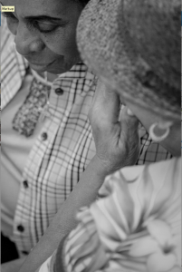 Bettye Garner and Essie Reed sharing a secret before class